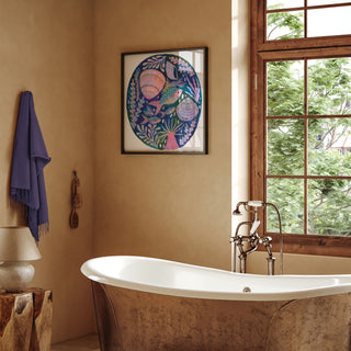 Original painting by Lee Foster-Wilson of fish, shells and sea anemone displayed in a neutral bathroom