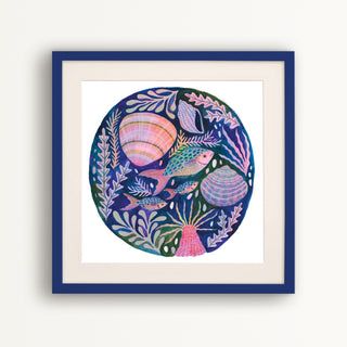 art print of colourful fish, shells and sea anemone by Lee Foster-Wilson displayed in a dark blue frame