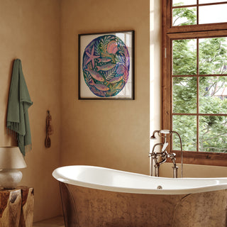 Art print of an original painting of fish, shells and starfish by Lee Foster-Wilson displayed in a neutral bathroom