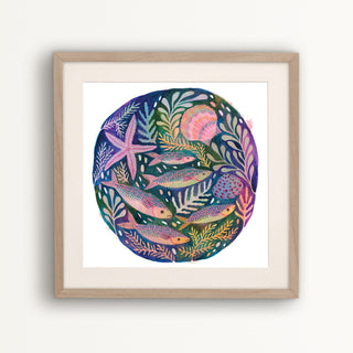 Art print of an original painting of fish, shells and starfish by Lee Foster-Wilson displayed in a wooden frame