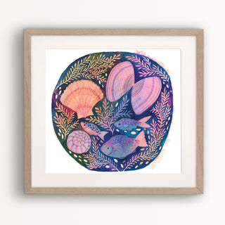 Mixed media painting of colourful fish and shells by Lee Foster-Wilson displayed in a wooden frame